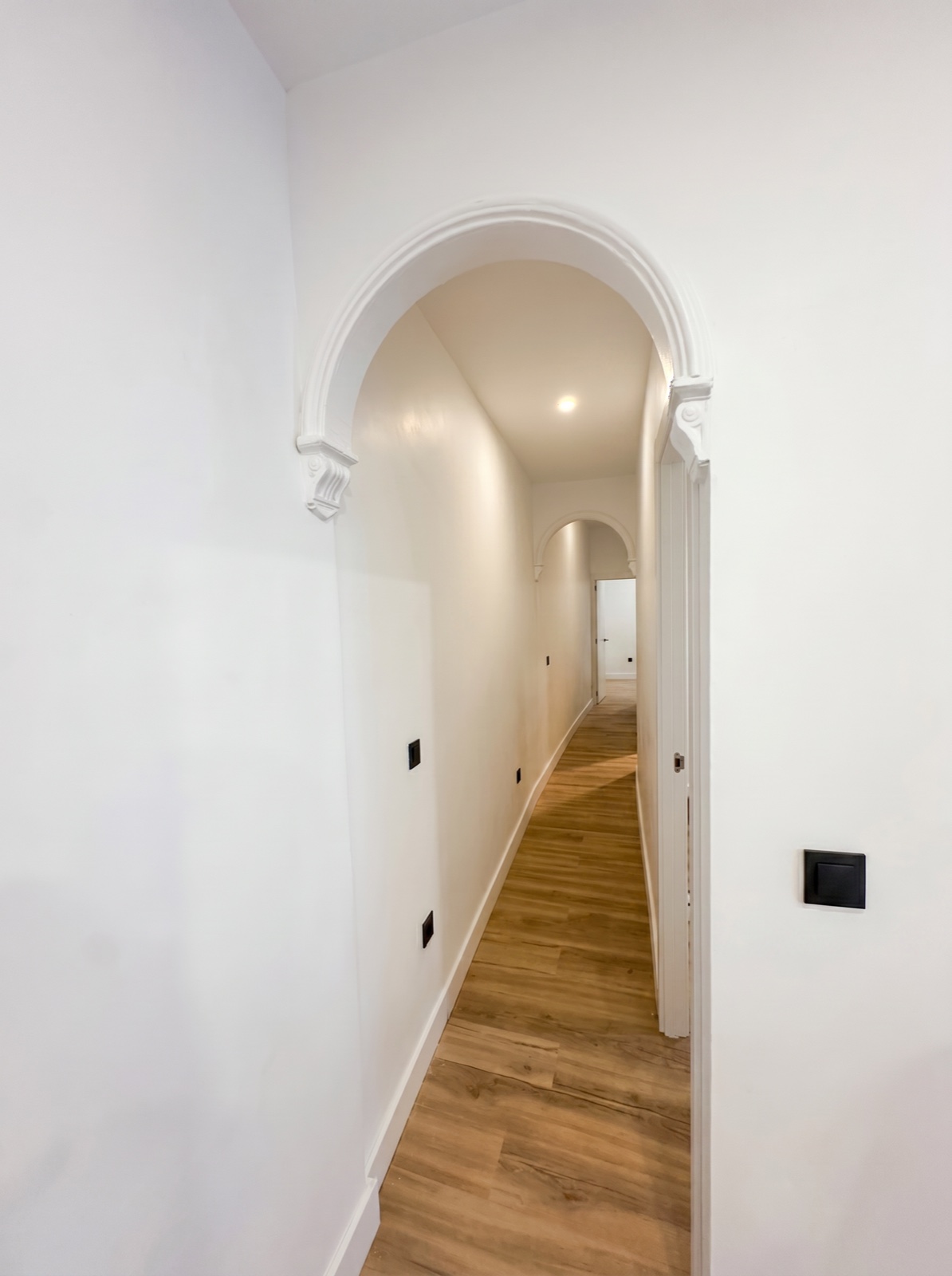 Restored arched hallway, after